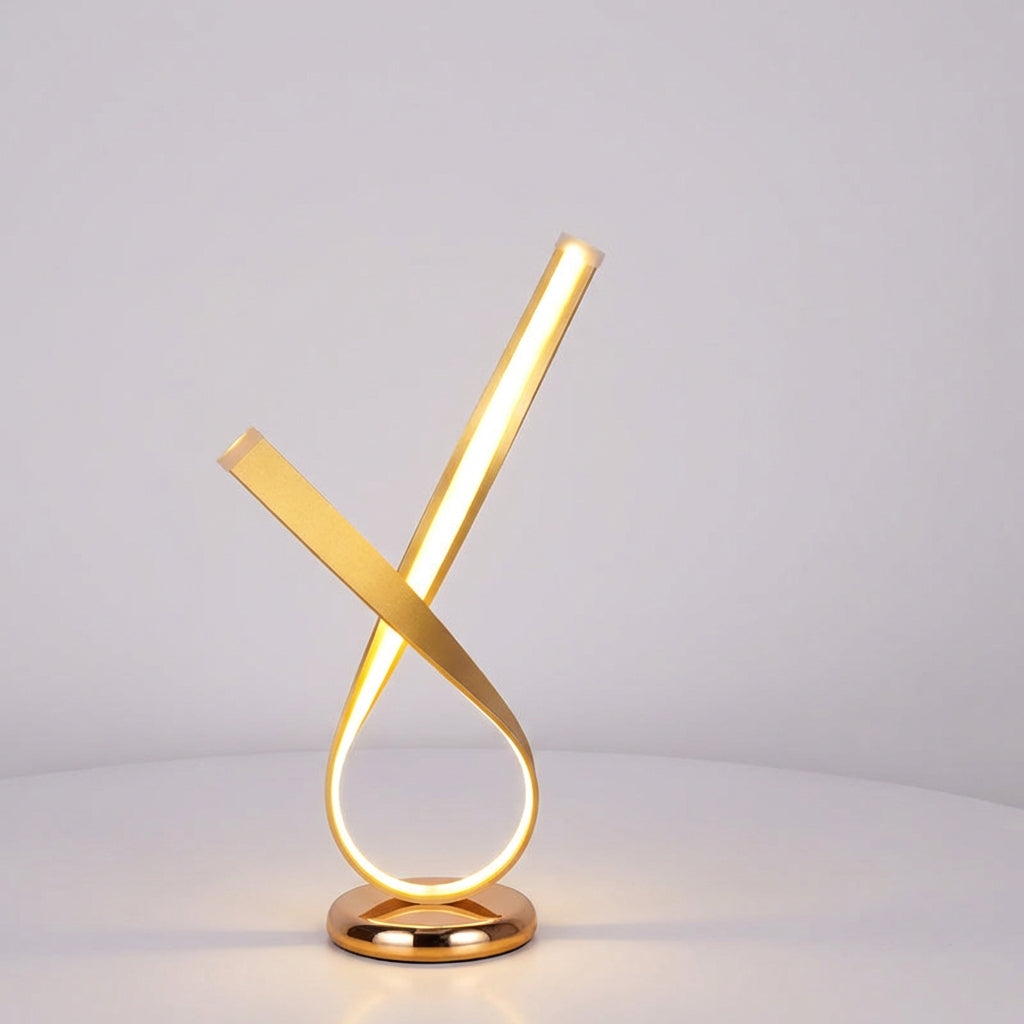 Skulpturale kompakte Tischlampe mit geschlungener Silhouette und Diffusor