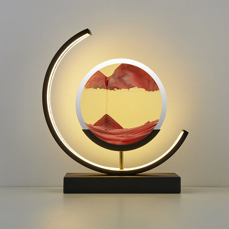Tischlampe mit rotierender Sandkunst-Skulptur und stimmungsvoller Beleuchtung