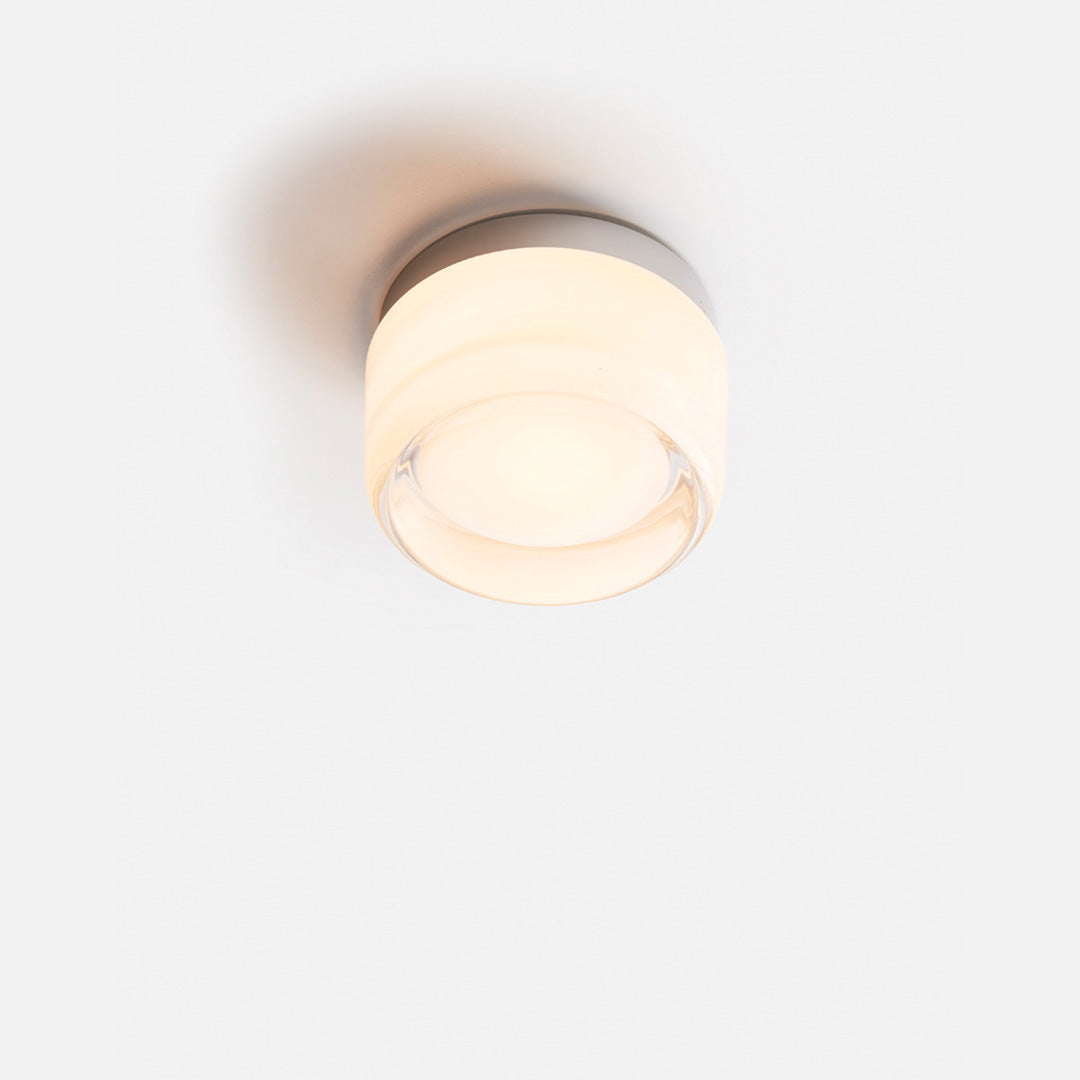 Moderne Wandleuchte aus Metall und Glas mit einstellbarem Lichtton
