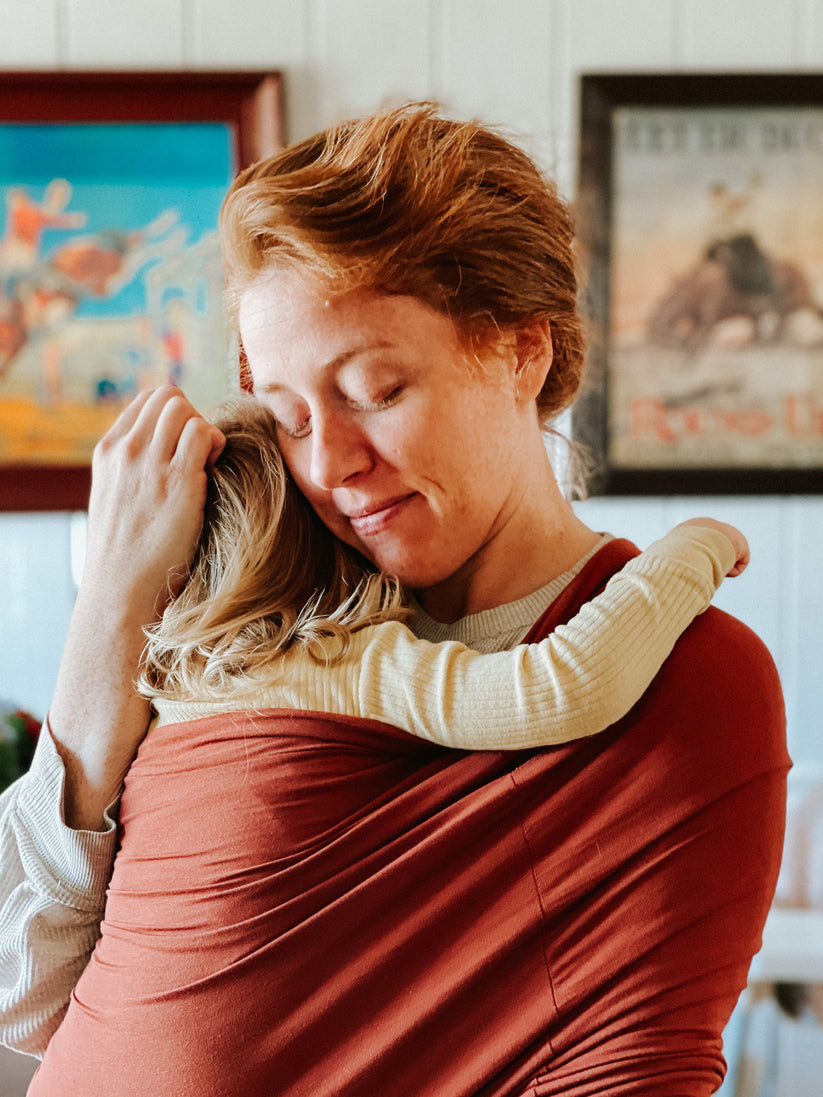 Ergonomisk åndbar justerbar håndfri babyvikle