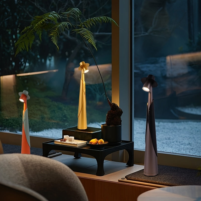 Skulpturale Tischlampe als Hutsilhouette mit Akku und Touch-Steuerung