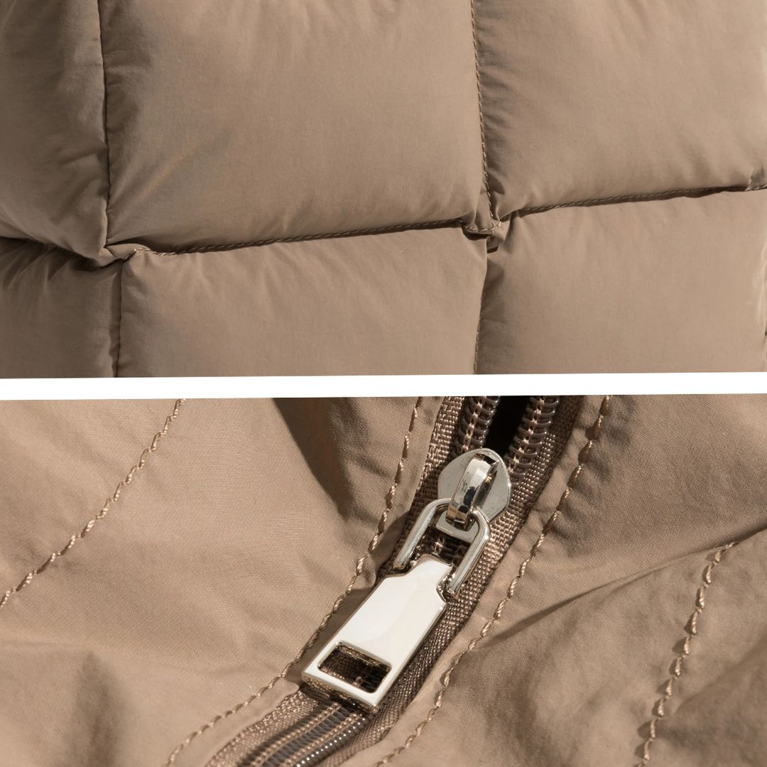 Vatteret, pufferdesignet skuldertaske i nylon med rummeligt laptoprum
