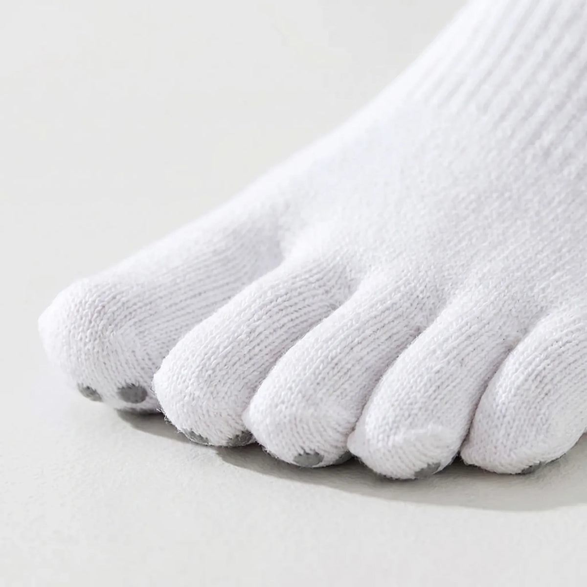Yoga-tåsokker med lav skaft, ribkant og skridsikre prikker