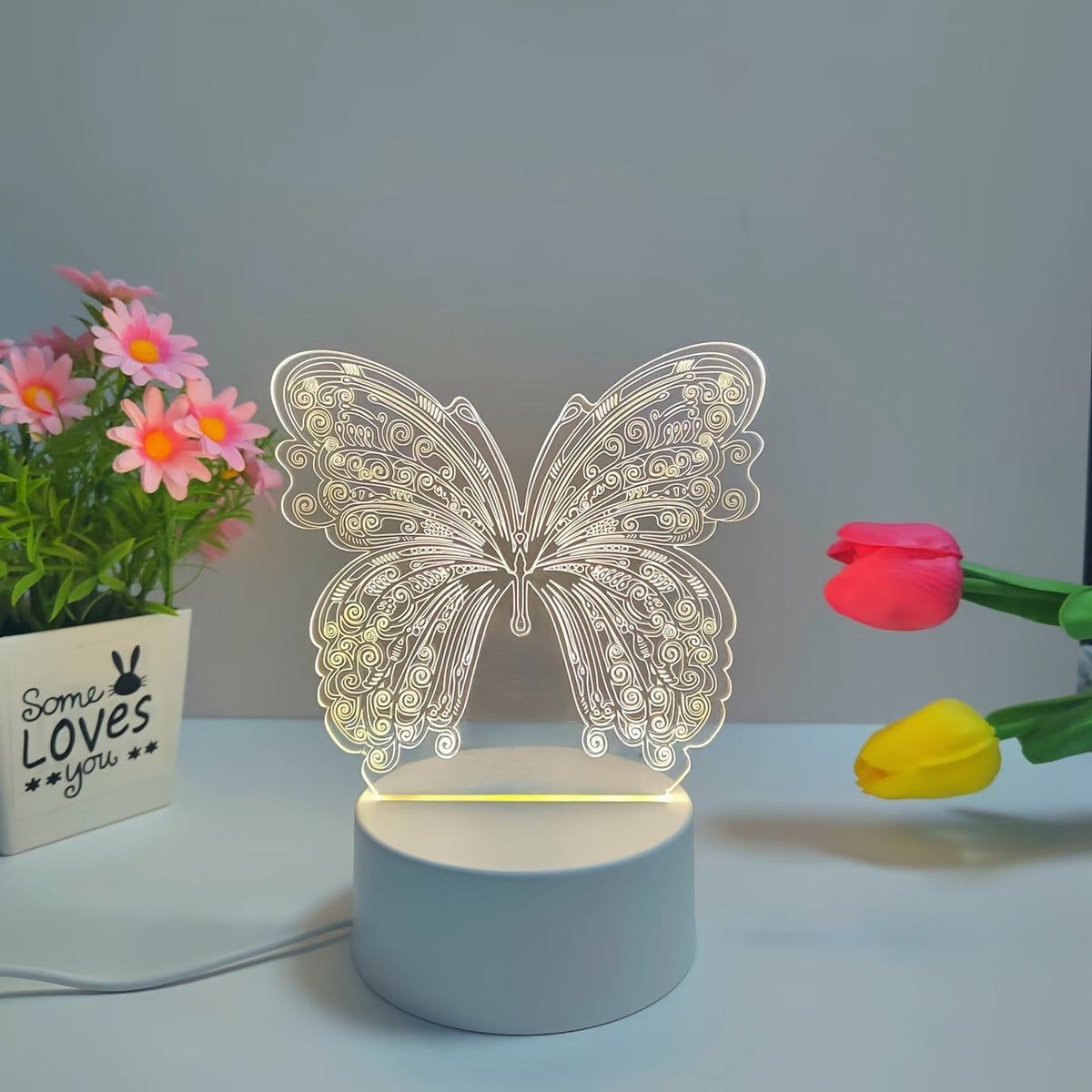 Moderne Tischlampe mit geometrischem Schmetterlingsausschnitt und USB-Stromversorgung