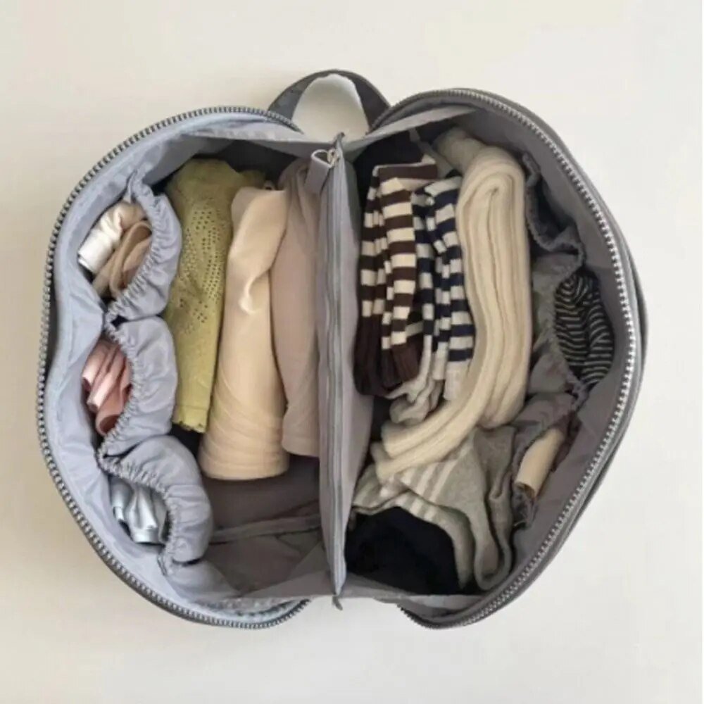 Kompakt rejsetoilettaskeorganizer i vasket nylon med bred åbning