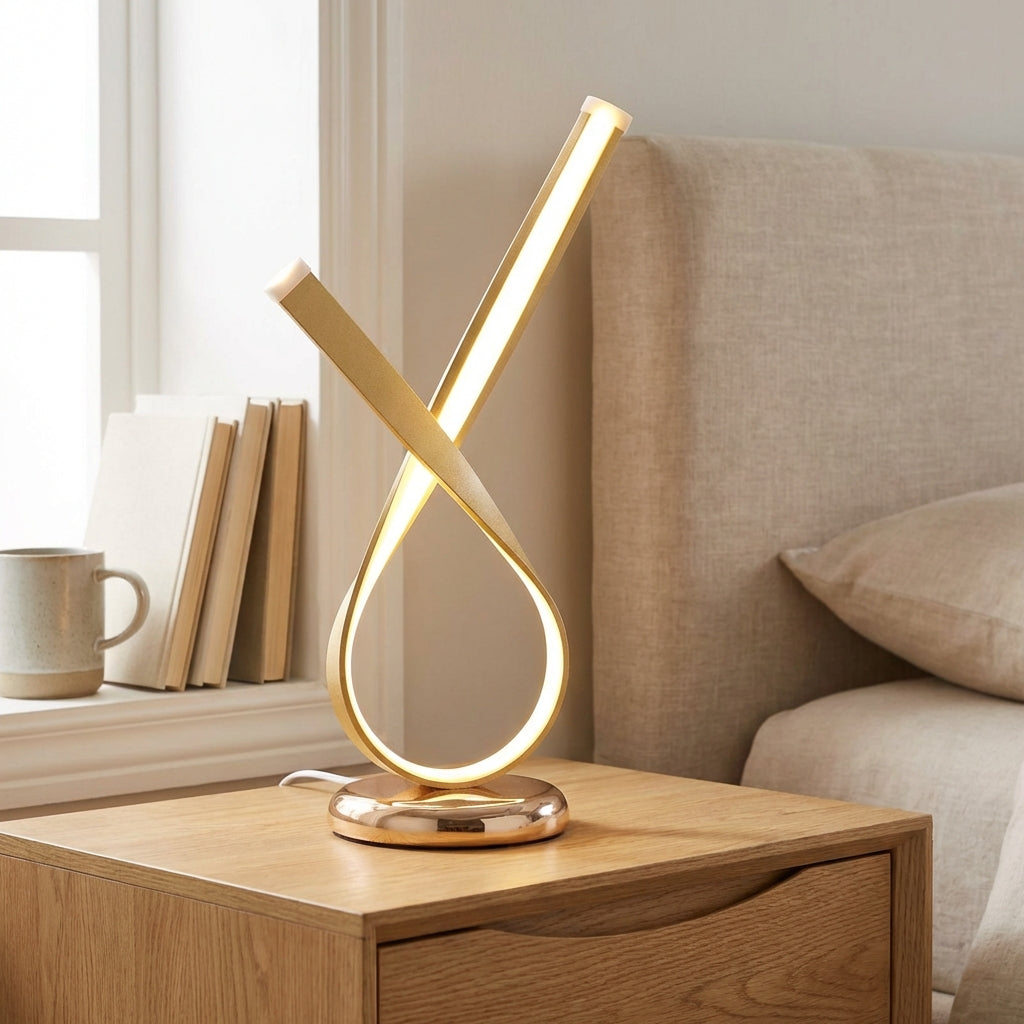 Skulpturale kompakte Tischlampe mit geschlungener Silhouette und Diffusor