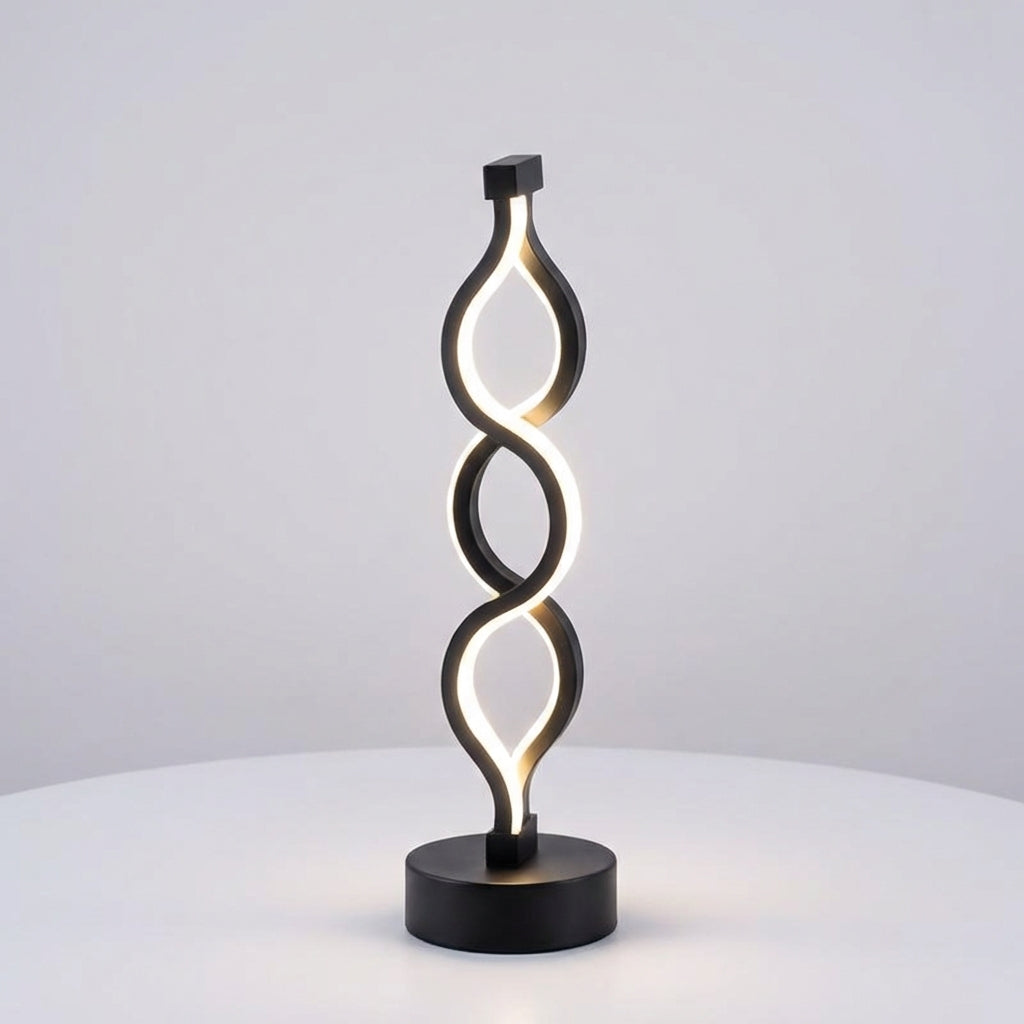 Kompakte skulpturale Tischlampe in Spiralform mit warmem Licht