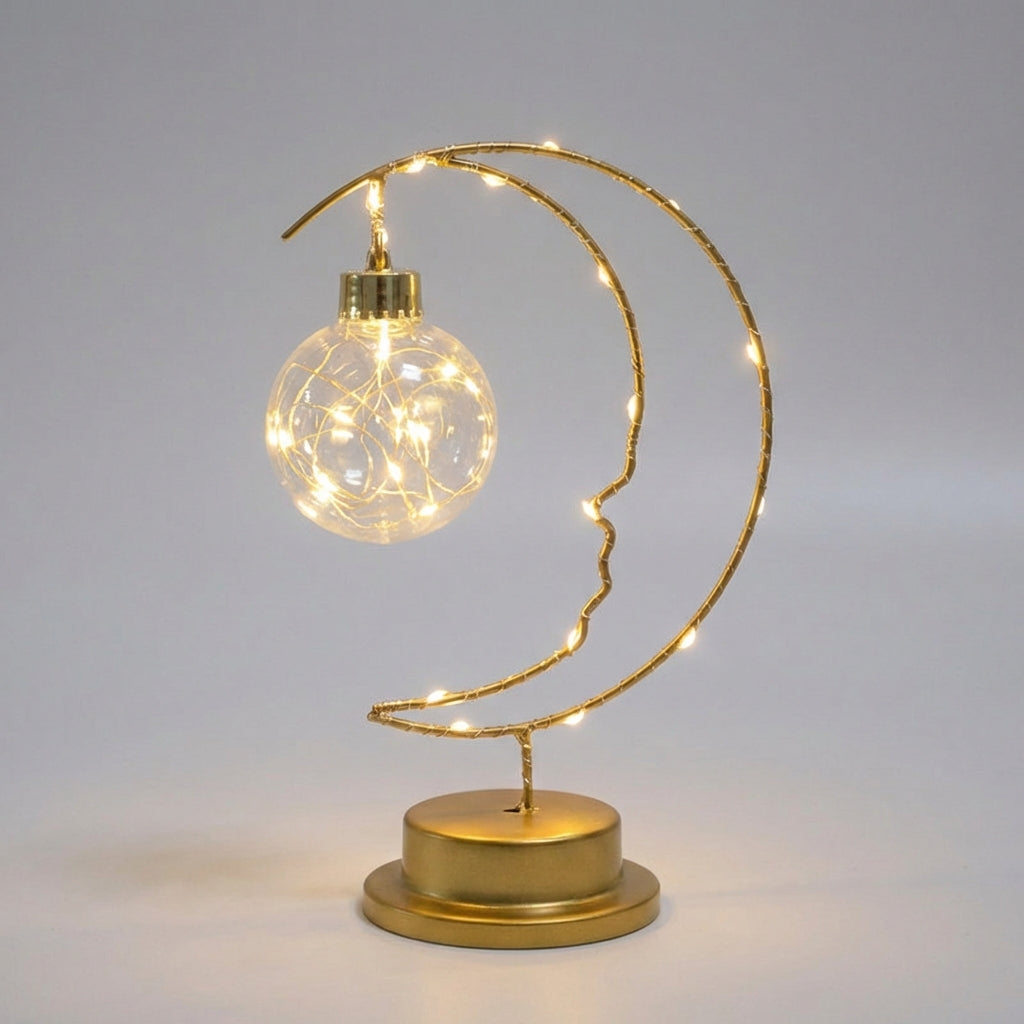 Dimm­bare Hängetischlampe mit geschwungener Mondsilhouette und gläsernem Stern