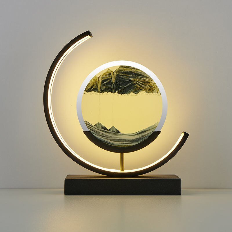 Tischlampe mit rotierender Sandkunst-Skulptur und stimmungsvoller Beleuchtung