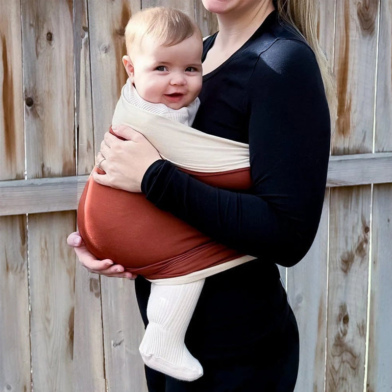 Blød, åndbar og ergonomisk håndfri justerbar babyvikle