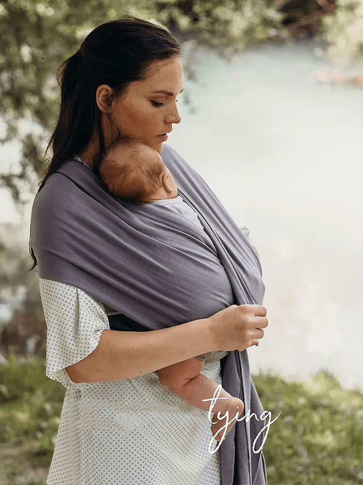 Ergonomisk åndbar justerbar håndfri babyvikle