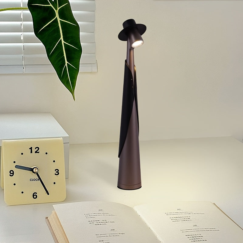Skulpturale Tischlampe als Hutsilhouette mit Akku und Touch-Steuerung