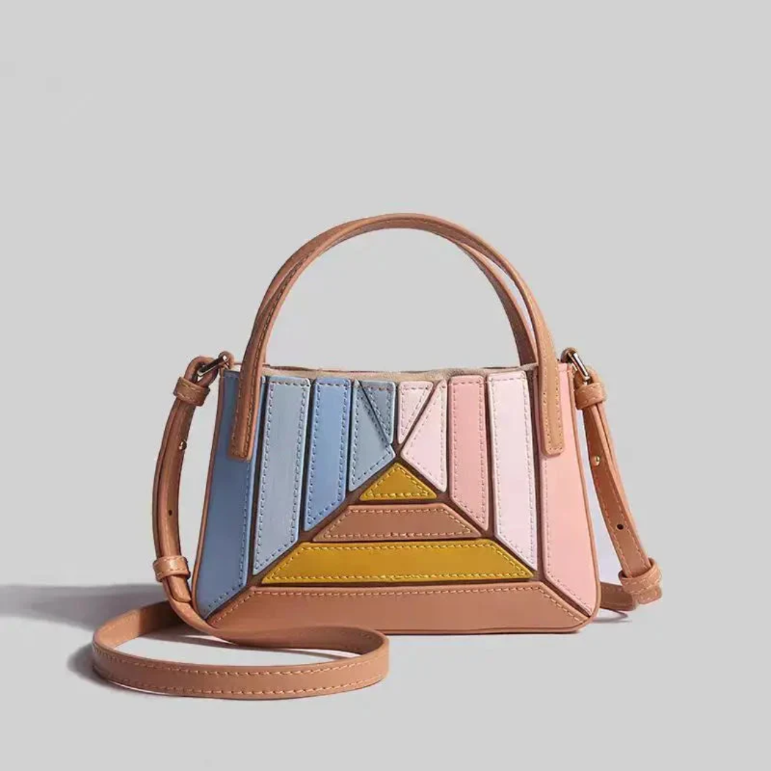 Geometrisk tote-håndtaske med flere paneler og rummeligt design til hverdagsbrug