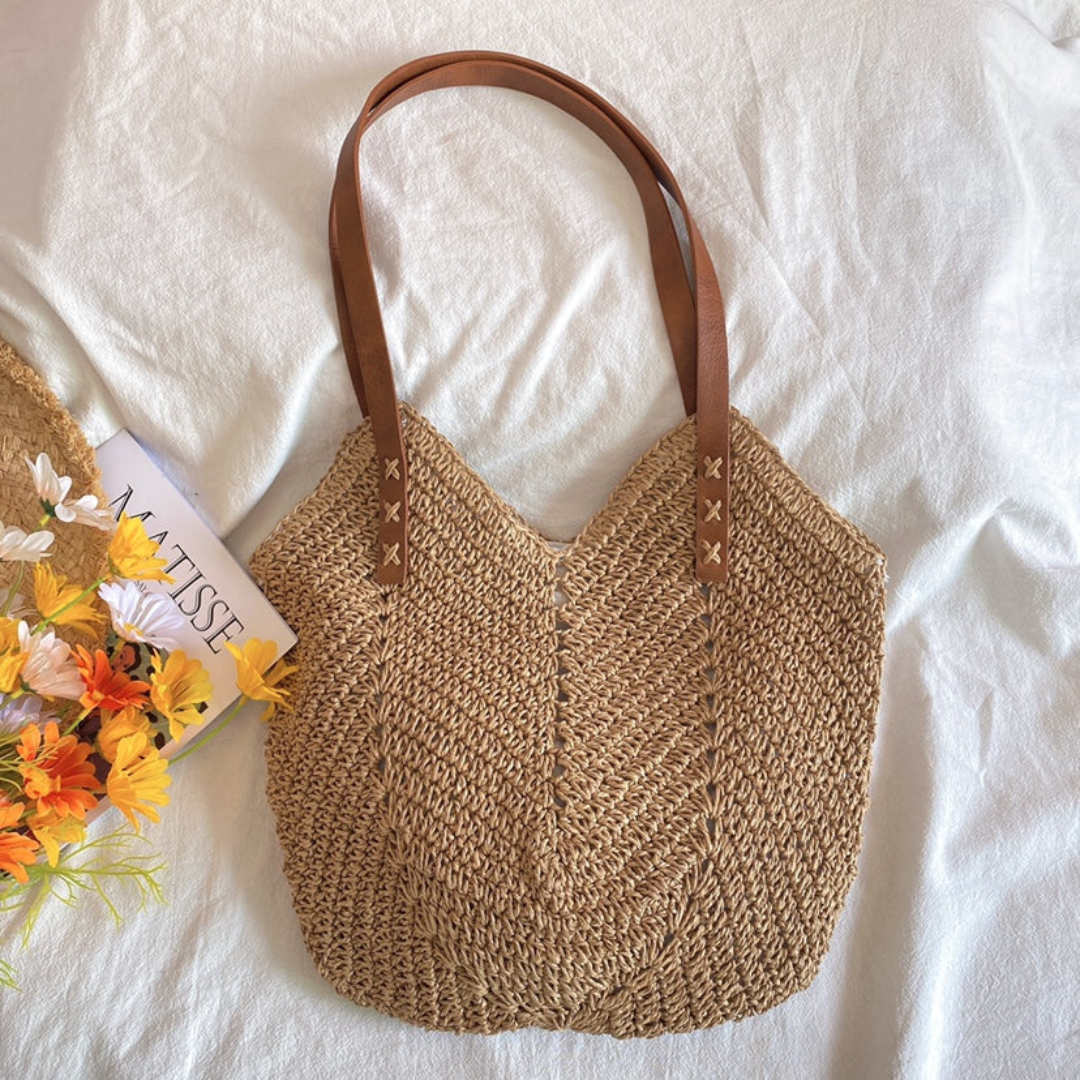Vævet afslappet skuldertaske med justerbar rem og god plads til kvinder