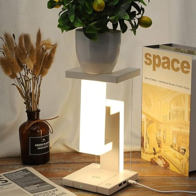 Bordlampe med svævende zonelys og trådløs opladning