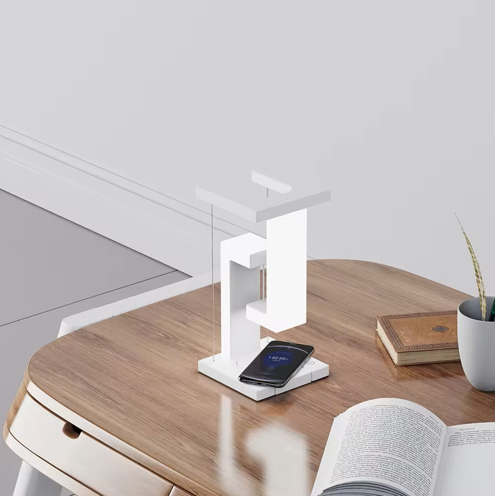 Bordlampe med svævende zonelys og trådløs opladning